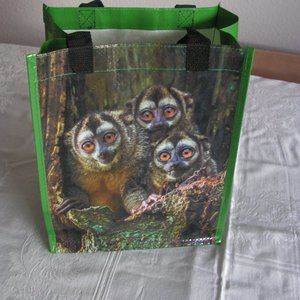 Medium reusable Nature Conservancy gray handed night monkey tote.
